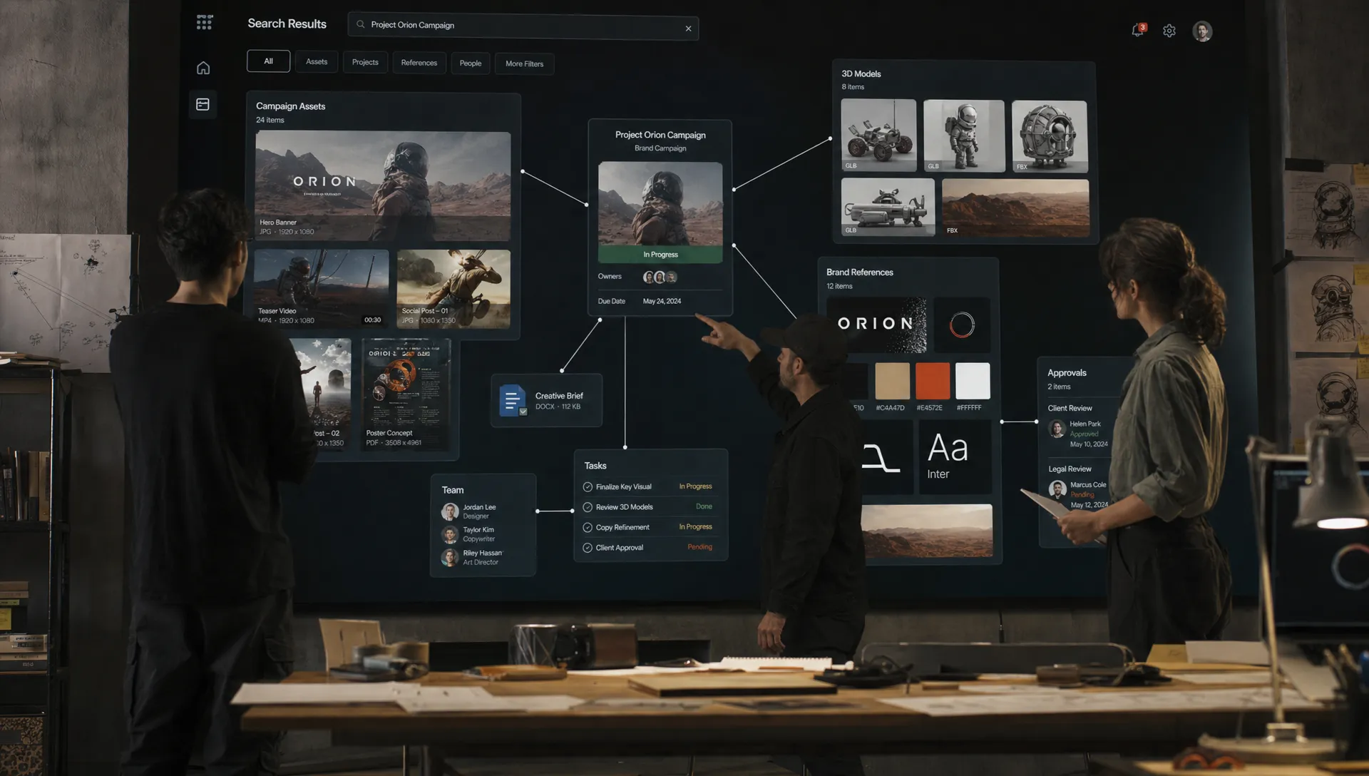 A creative operations team examining a large search results wall with campaign assets, 3D models, brand references, and approval notes connected across the studio, with the information arranged in clear linked clusters.