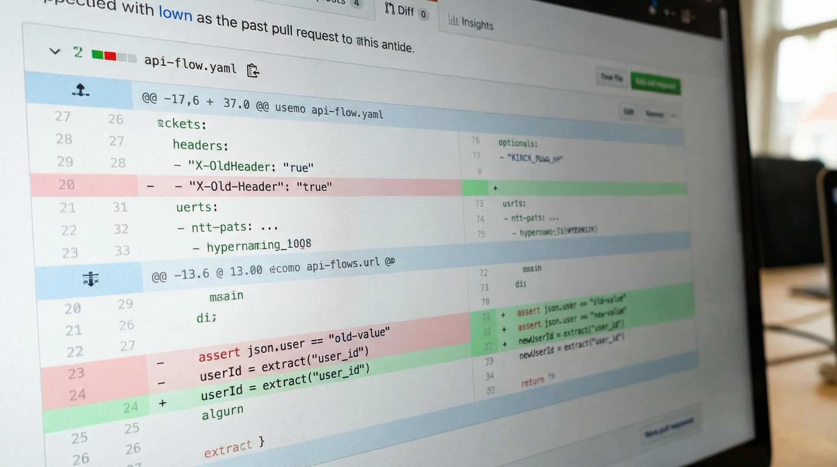 A pull request diff view showing a small, readable YAML change to an API flow: one header removed, one assertion updated, and one extracted variable renamed.