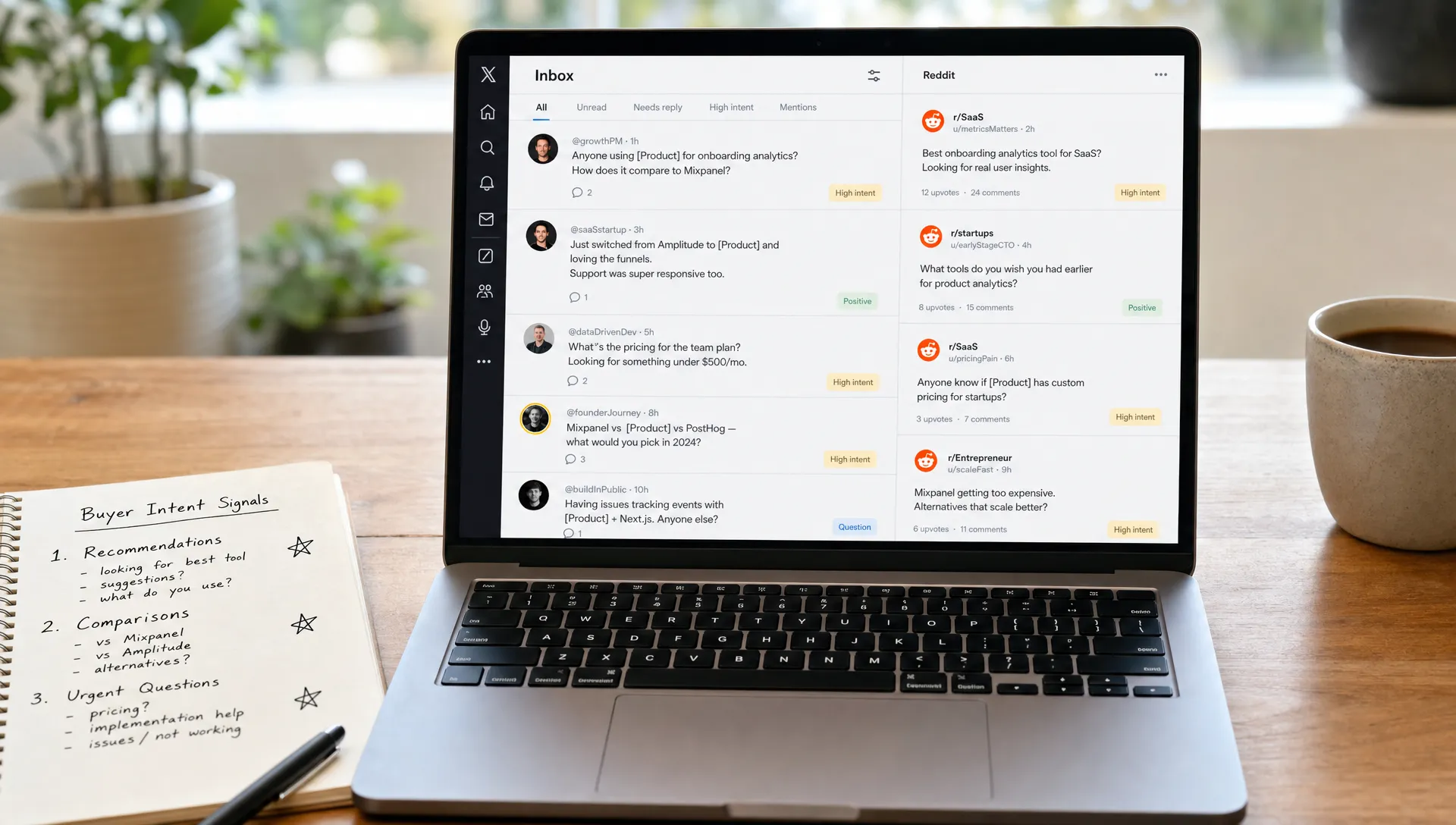 A founder reviewing a focused inbox of relevant X and Reddit conversations on a laptop screen facing the viewer, with notes beside the keyboard showing buyer intent signals like recommendations, comparisons, and urgent questions.