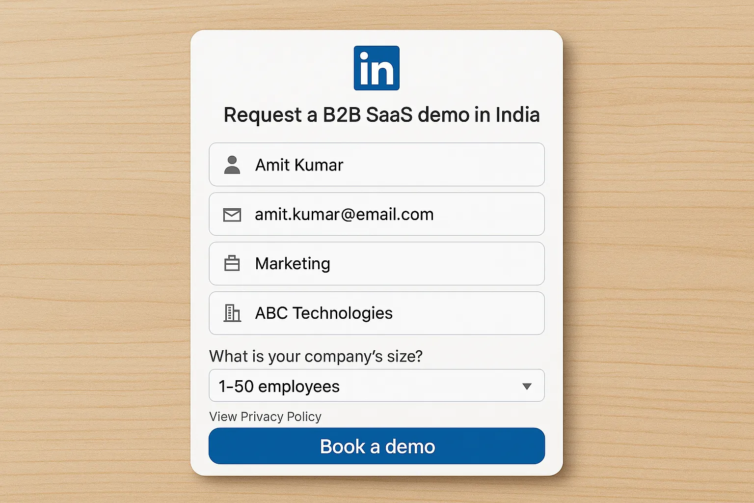A close-up illustration of a LinkedIn Lead Gen Form for a B2B SaaS demo request in India, showing a short headline, 4 pre-filled fields (name, email, job function, company), one custom qualification question, a privacy policy link, and a bold &ldquo;Book a demo&rdquo; CTA.