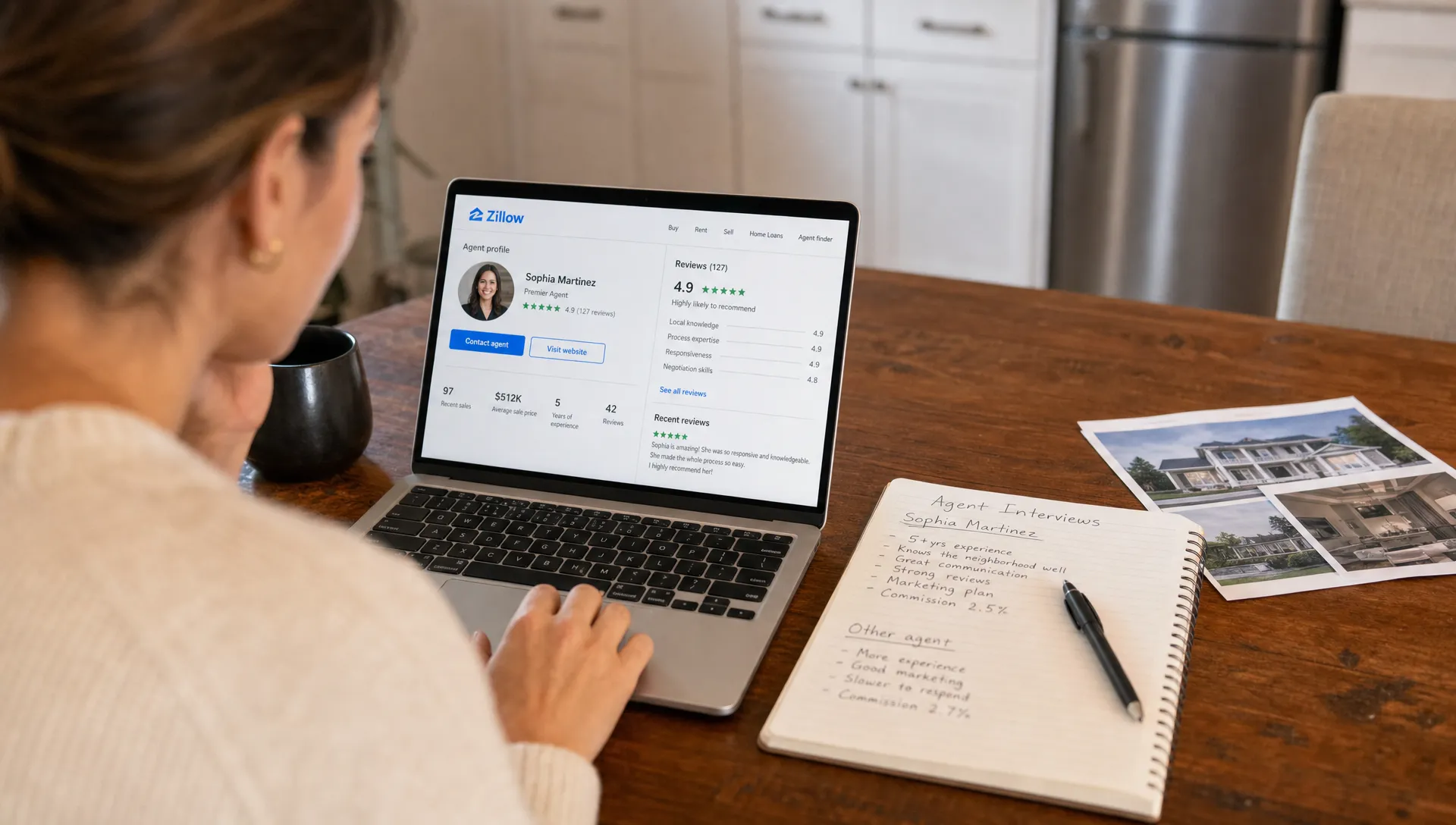 A homeowner comparing Zillow real estate agent reviews with an agent profile, listing photos, and handwritten interview notes on a kitchen table.