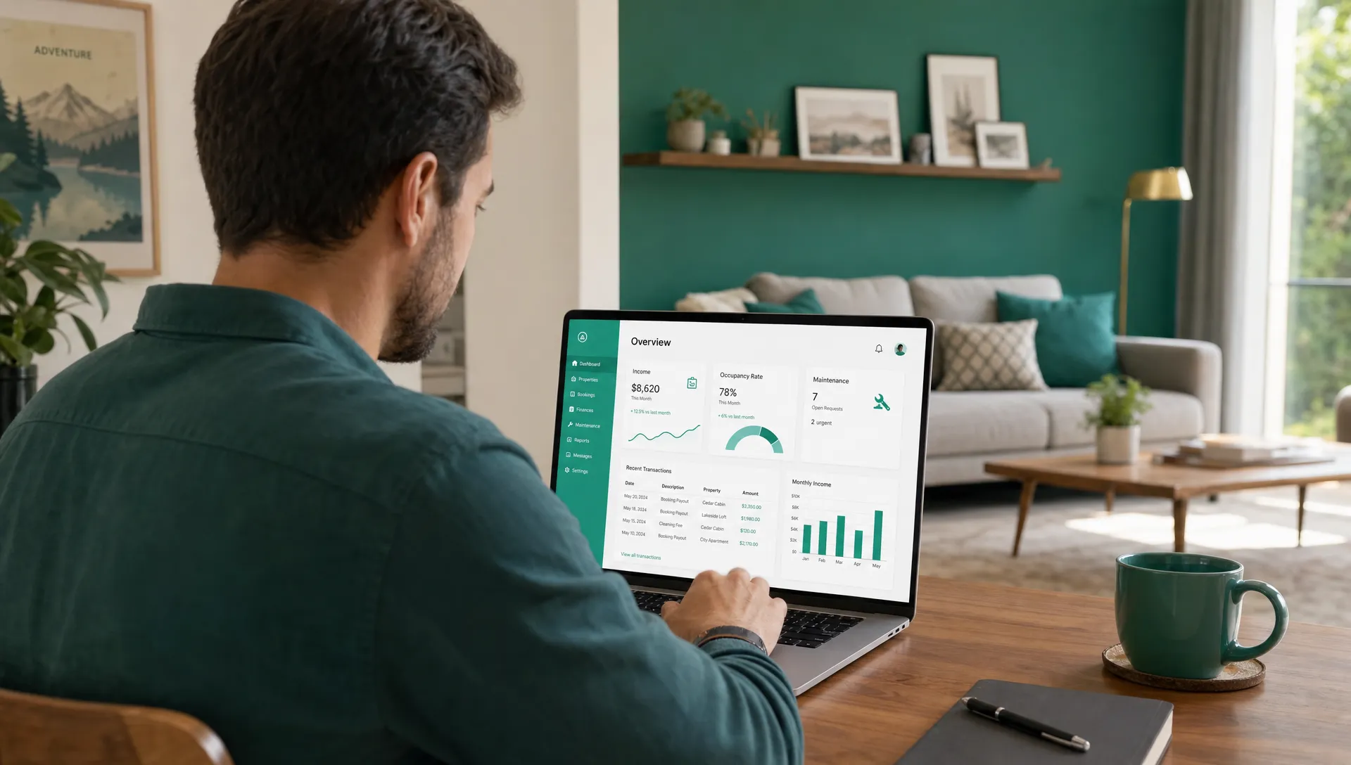 An owner reviews income, occupancy, and maintenance summaries on a laptop in a furnished rental living area.