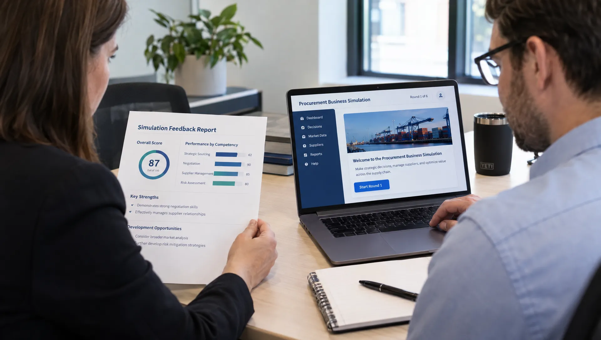 An instructor tests a business simulation pilot on a laptop while a procurement evaluator checks the sample feedback report and scorecard beside them.